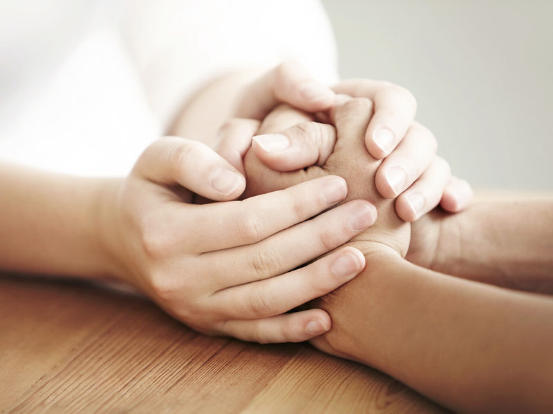 Hands folded in prayer